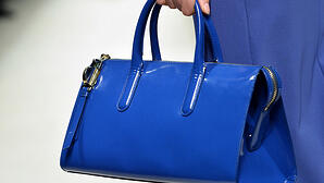 Giving up the big purse.