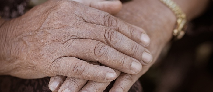 Elderly woman's hands.